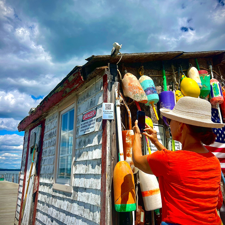 QRdept interactive storytelling platform dashboard showing QR code creation interface with multimedia content options